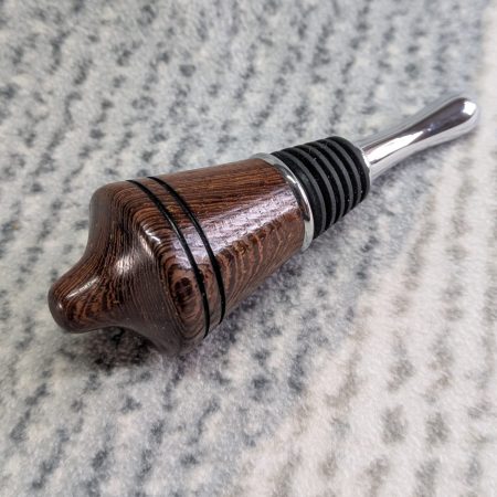 Hand turned bottle stopper made from panga panga wood