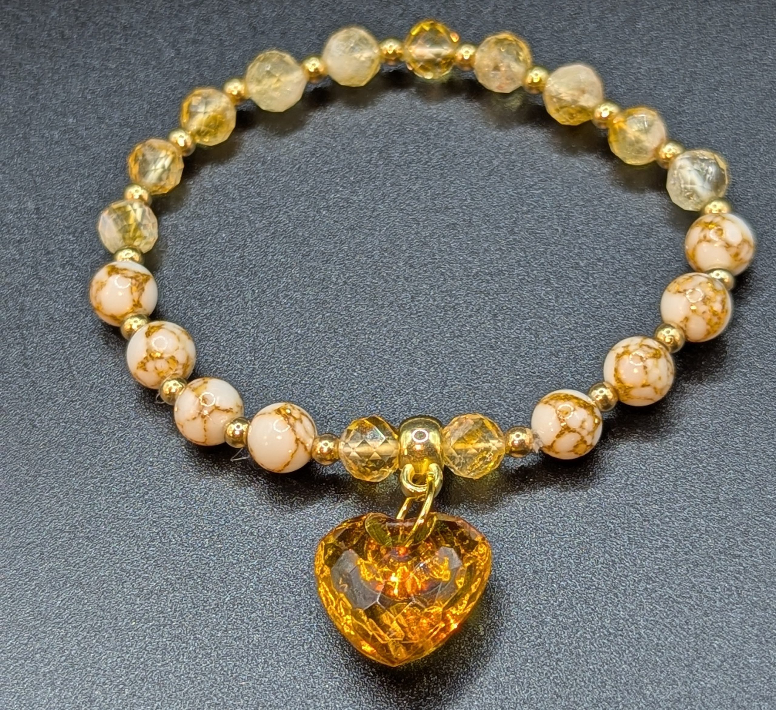 Gold spun Howlite and Citrine expandable bracelet with faux crystal charm