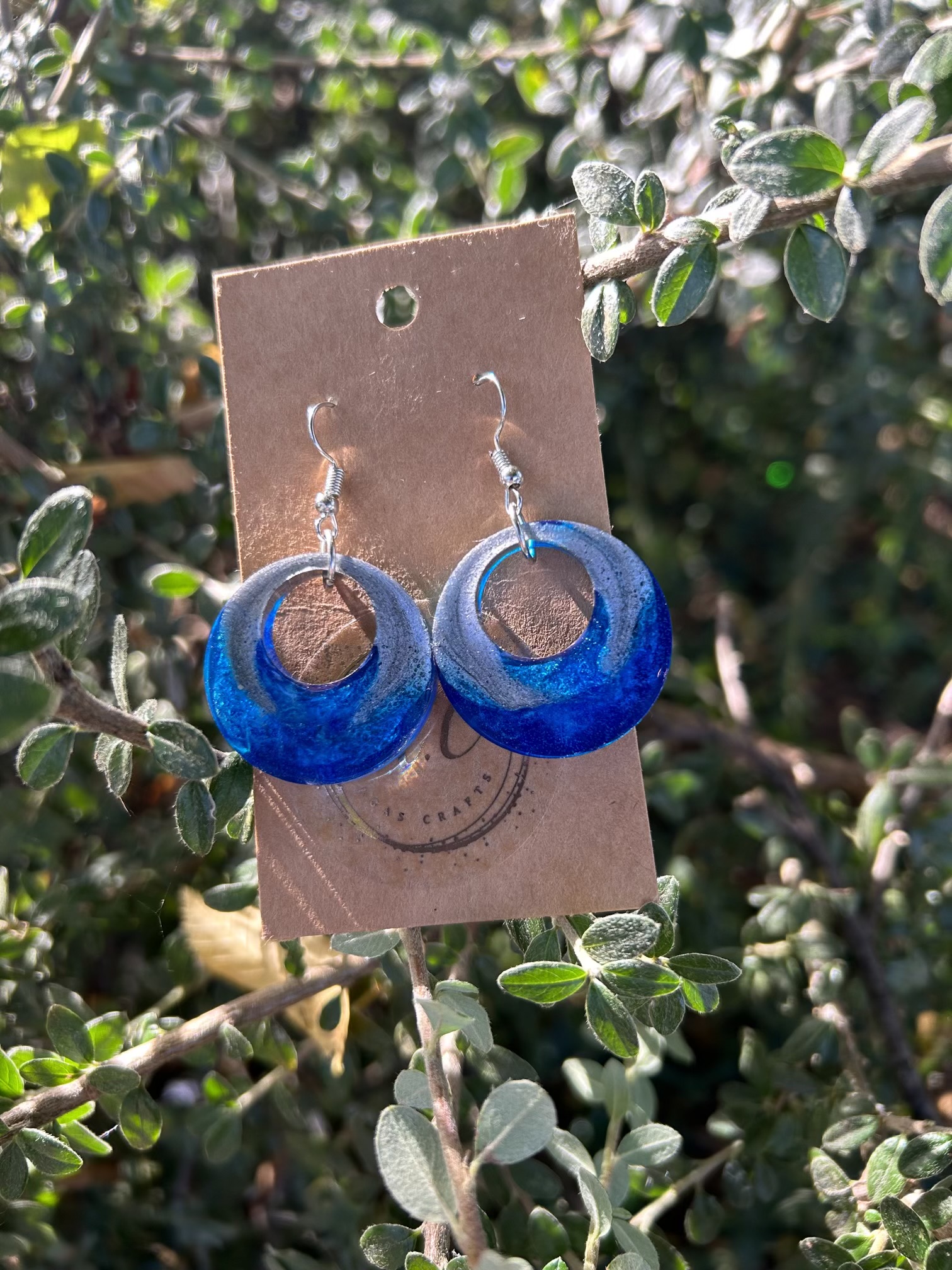 Blue and silver raund resin earrings