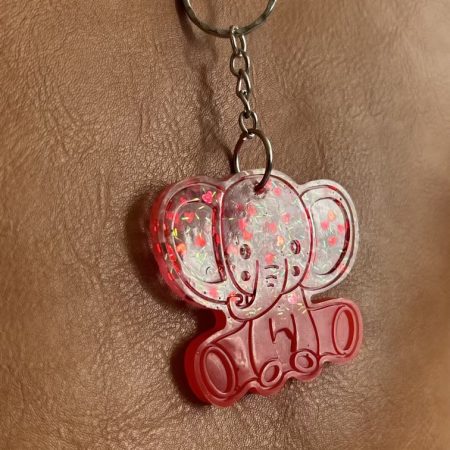 Resin elephant keychain with small heart sequins and fine sparkly glitter