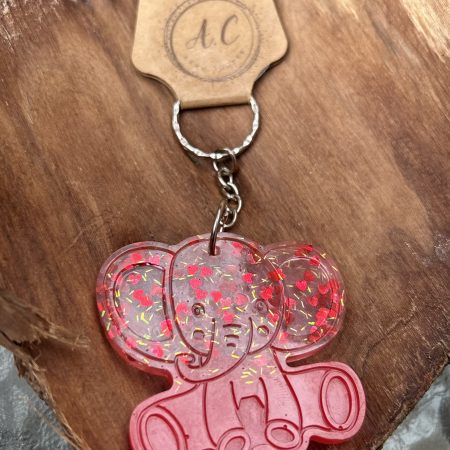 Resin elephant keychain with small heart sequins and fine sparkly glitter