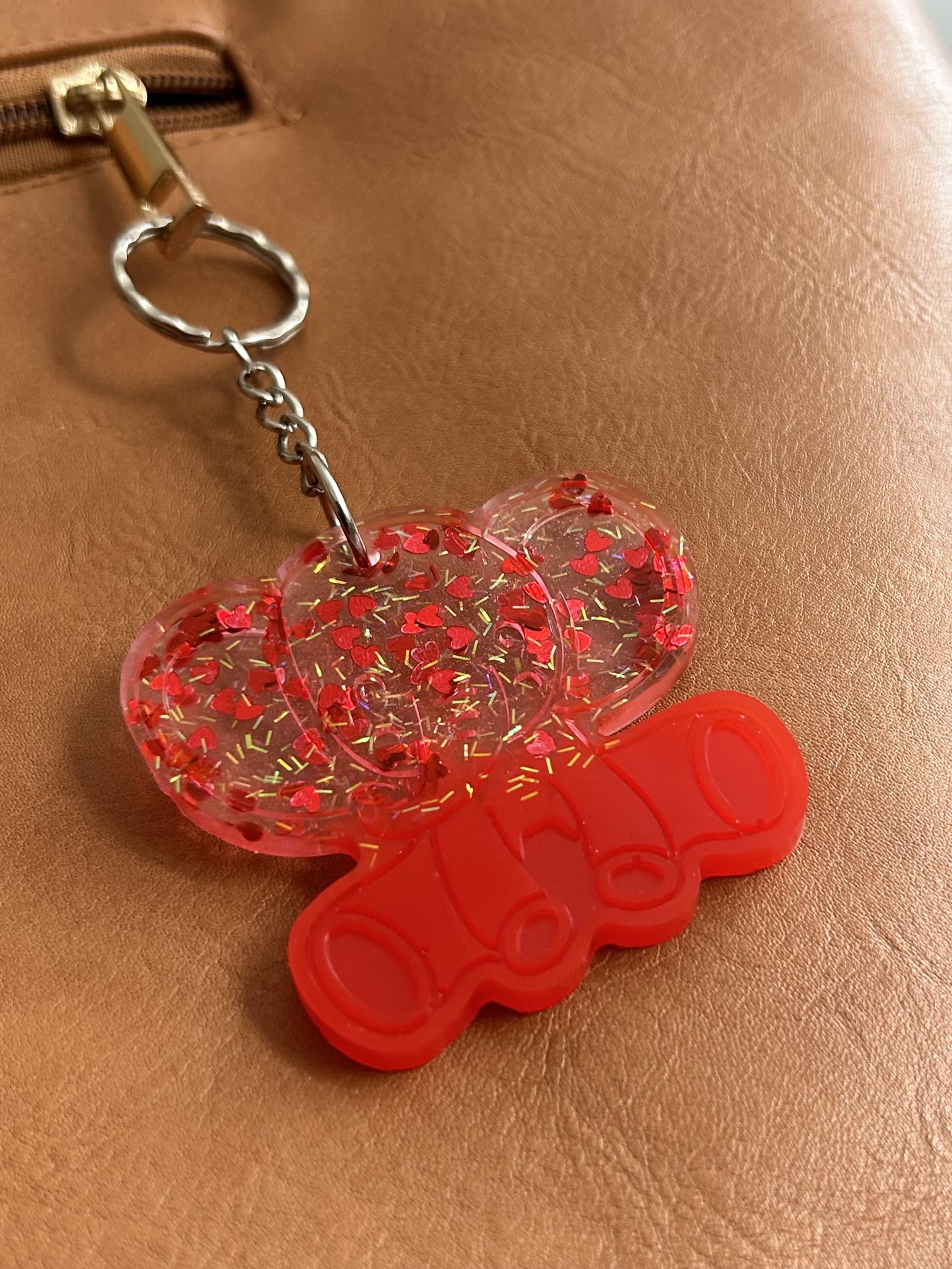 Resin elephant keychain with small heart sequins and fine sparkly glitter