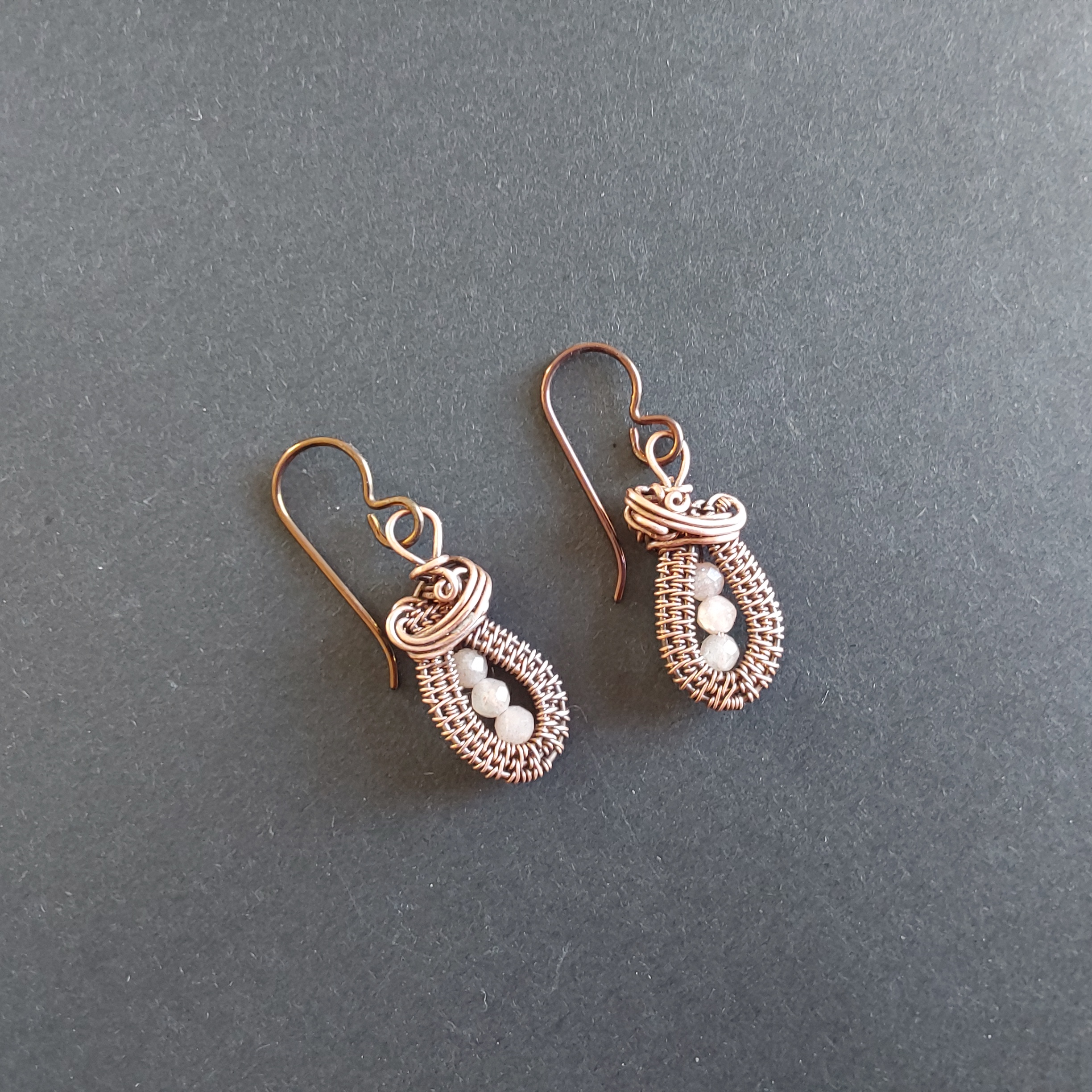 Faceted Peach Moonstone antiqued copper wire weave dangly earrings