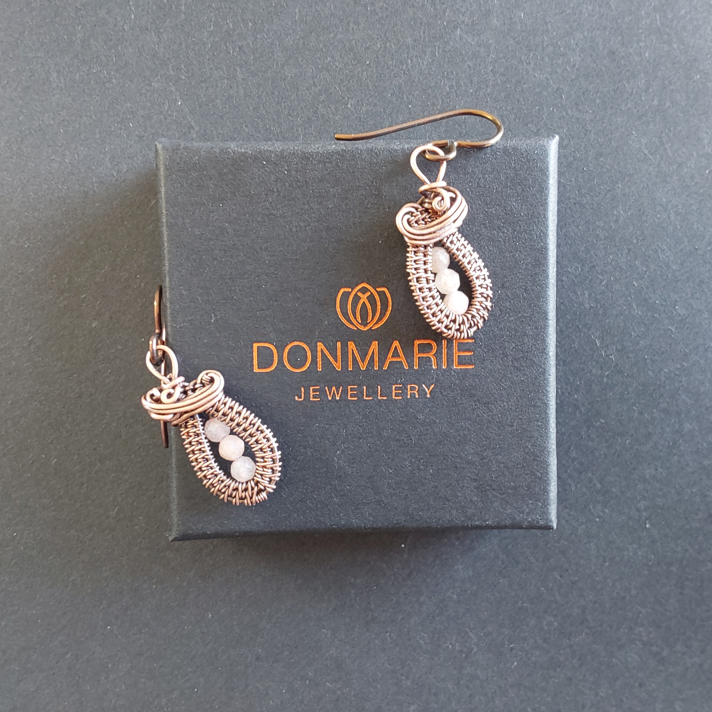 Faceted Peach Moonstone antiqued copper wire weave dangly earrings