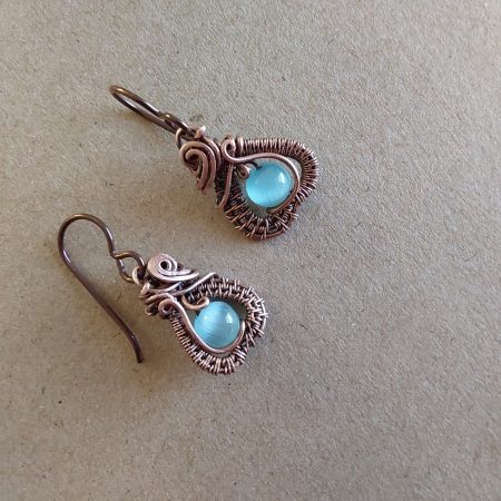 Intricate wire weave earrings with Blue Cats Eye beads