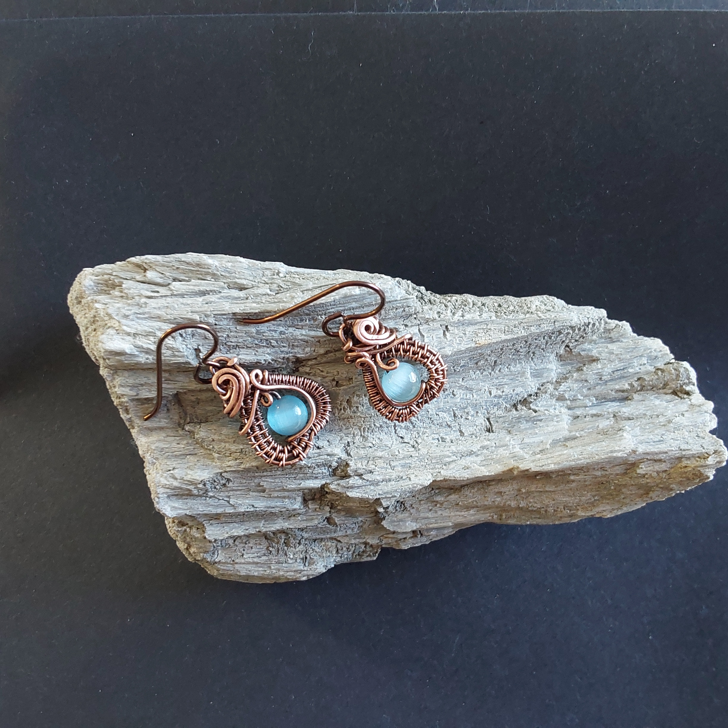Intricate wire weave earrings with Blue Cats Eye beads