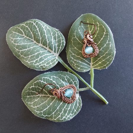 Intricate wire weave earrings with Blue Cats Eye beads