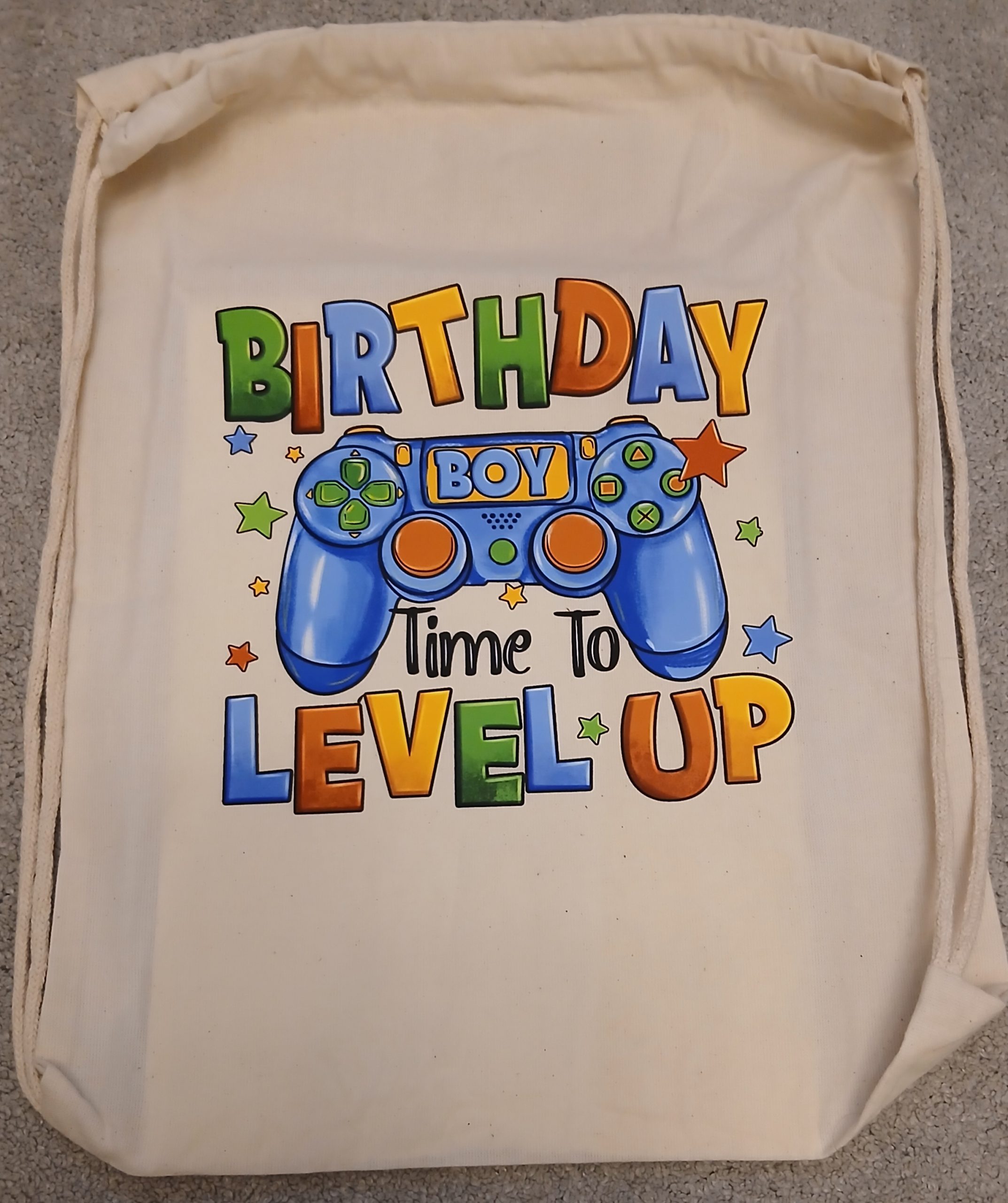 Birthday boy game drawstring bag