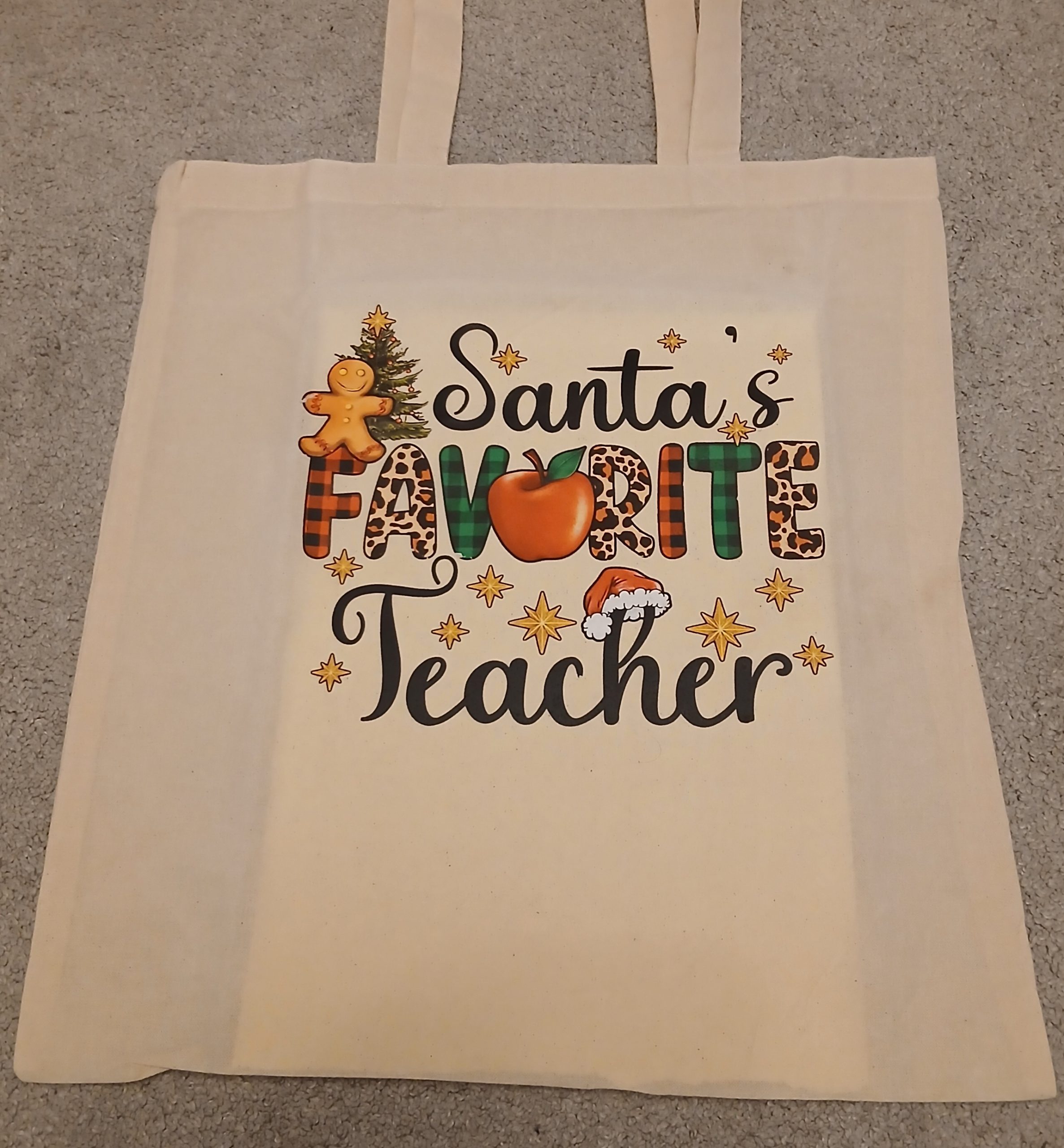 Santa's favourite teacher tote bag