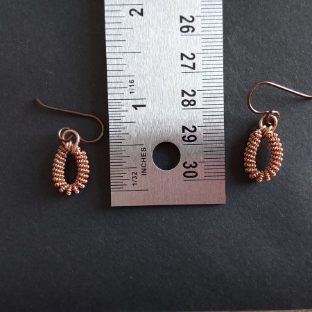 Handmade copper coiled coil dangly earrings with Niobium hypoallergenic ear wires.