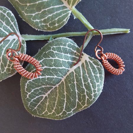 Handmade copper coiled coil dangly earrings with Niobium hypoallergenic ear wires.