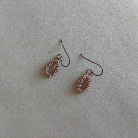 Handmade copper coiled coil dangly earrings with Niobium hypoallergenic ear wires.