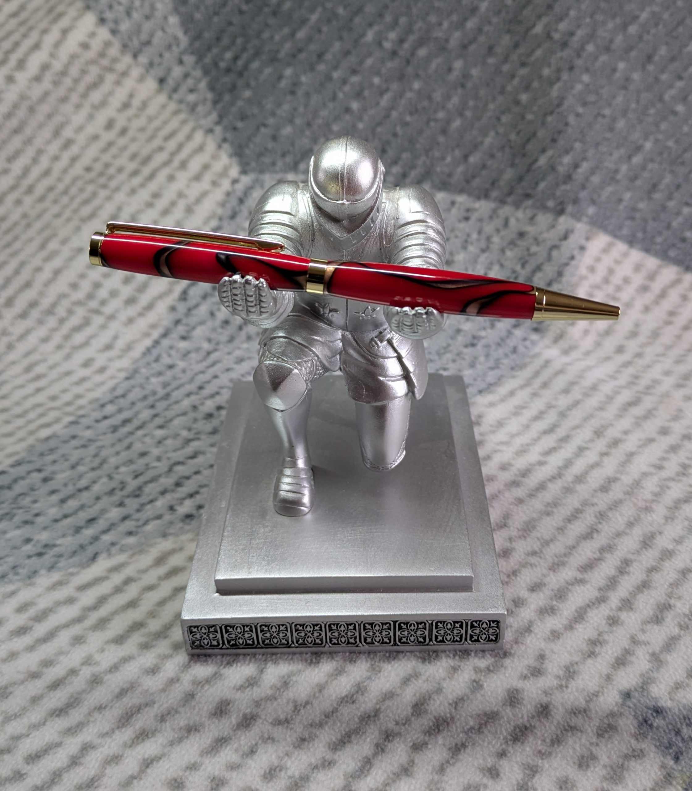 Slimline twist pen in red acrylic with gold coloured fittings