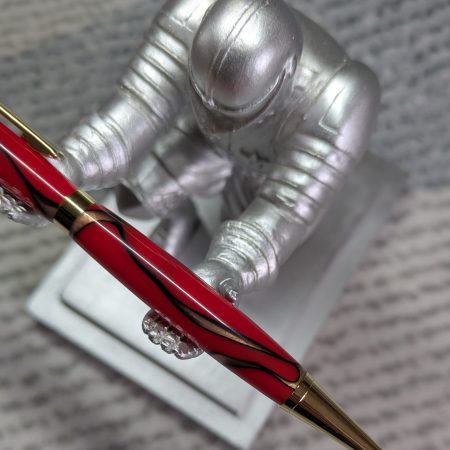 Slimline twist pen in red acrylic with gold coloured fittings