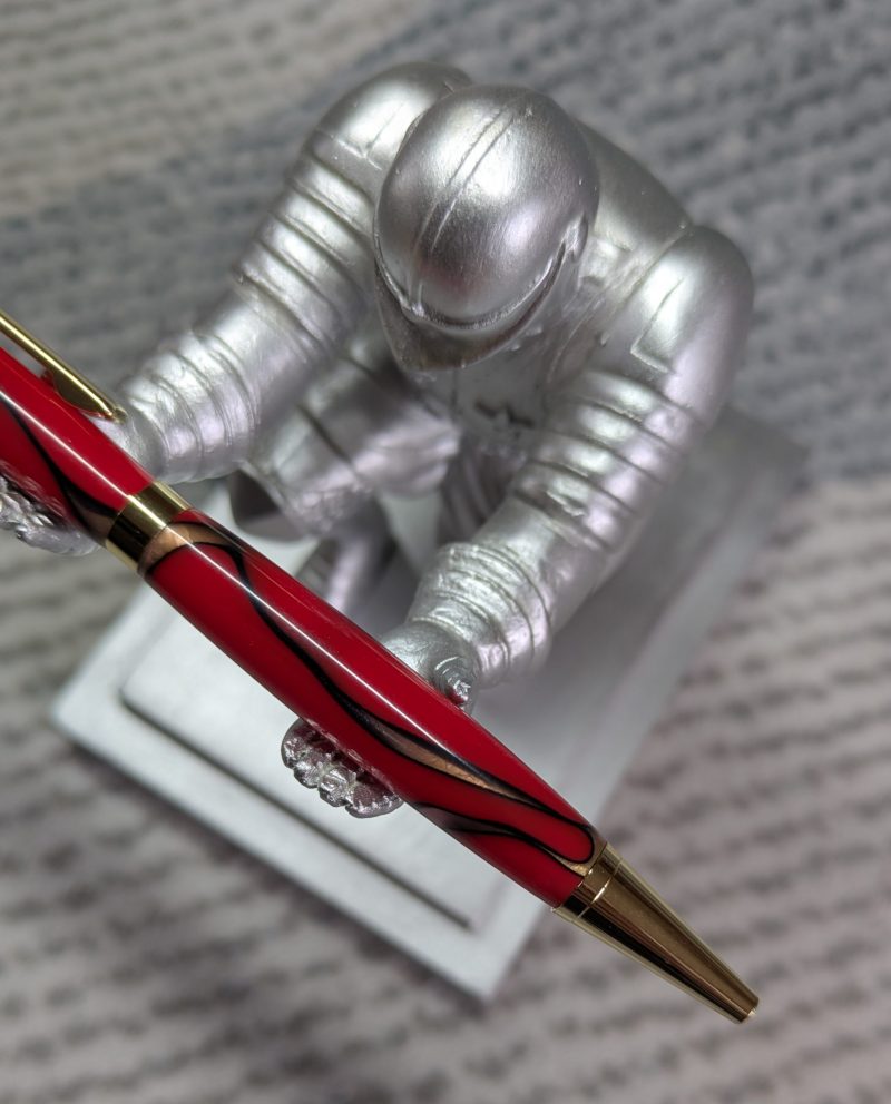 Slimline twist pen in red acrylic with gold coloured fittings