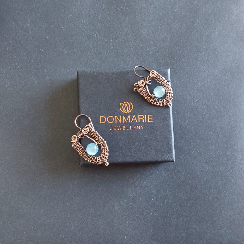 Wire weave Blue Cats Eye dangly earrings.