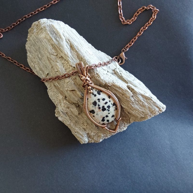 Antiqued copper wire wrapped Dalmation Jasper cabochon pendant with 18 inch copper colour chain and free Tracked postage.