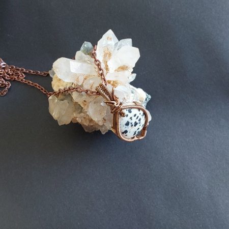 Antiqued copper wire wrapped Dalmation Jasper cabochon pendant with 18 inch copper colour chain and free Tracked postage.