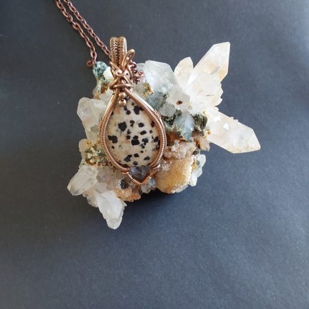 Antiqued copper wire wrapped Dalmation Jasper cabochon pendant with 18 inch copper colour chain and free Tracked postage.