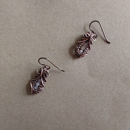 Faceted Peach Moonstone 'Ballet Shoe' style earrings with hypoallergenic ear wires. The wire weave component of each earring is approximately 1/2 an inch (2cm) in length plus ear wire length of 2 cm.