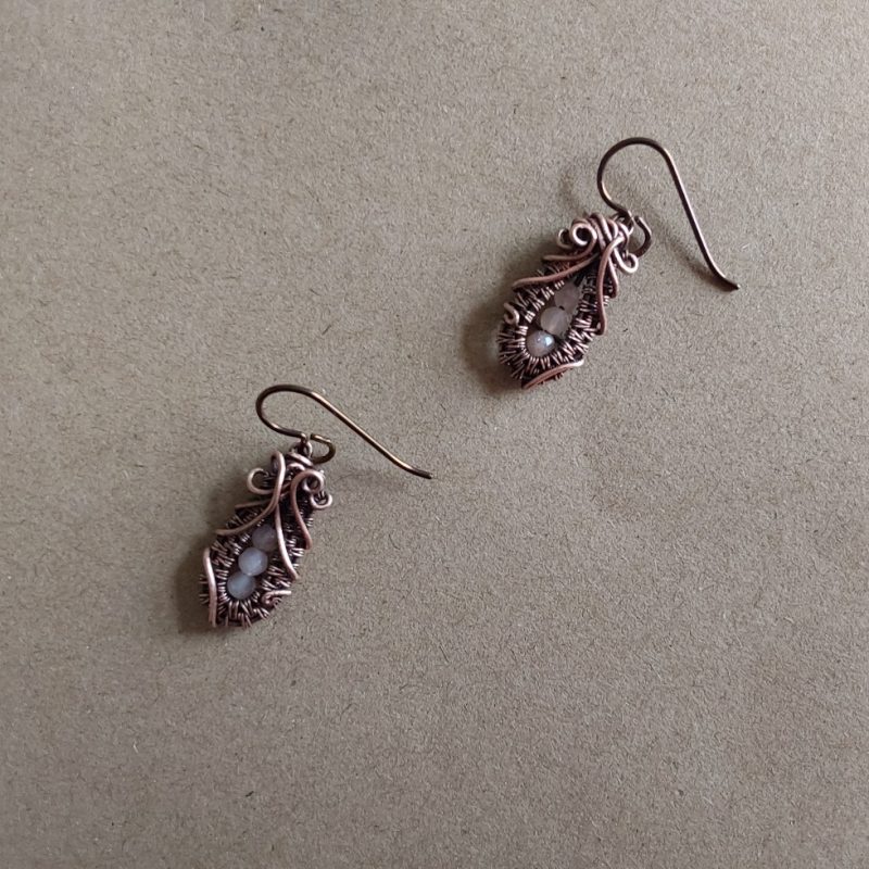 Faceted Peach Moonstone 'Ballet Shoe' style earrings with hypoallergenic ear wires. The wire weave component of each earring is approximately 1/2 an inch (2cm) in length plus ear wire length of 2 cm.