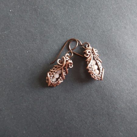 Faceted Peach Moonstone 'Ballet Shoe' style earrings with hypoallergenic ear wires. The wire weave component of each earring is approximately 1/2 an inch (2cm) in length plus ear wire length of 2 cm.
