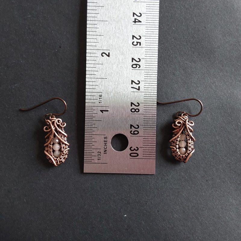 Faceted Peach Moonstone 'Ballet Shoe' style earrings with hypoallergenic ear wires. The wire weave component of each earring is approximately 1/2 an inch (2cm) in length plus ear wire length of 2 cm.