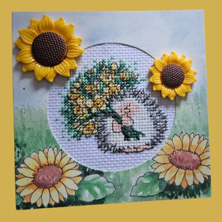 Hedgehog & sunflowers hand made cross stitched greetings card. 12cm x 12cm