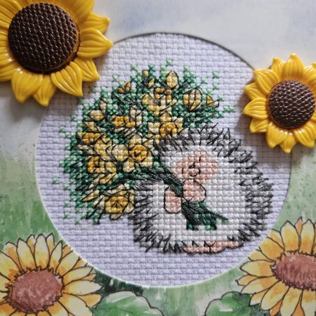 Hedgehog & sunflowers hand made cross stitched greetings card. 12cm x 12cm
