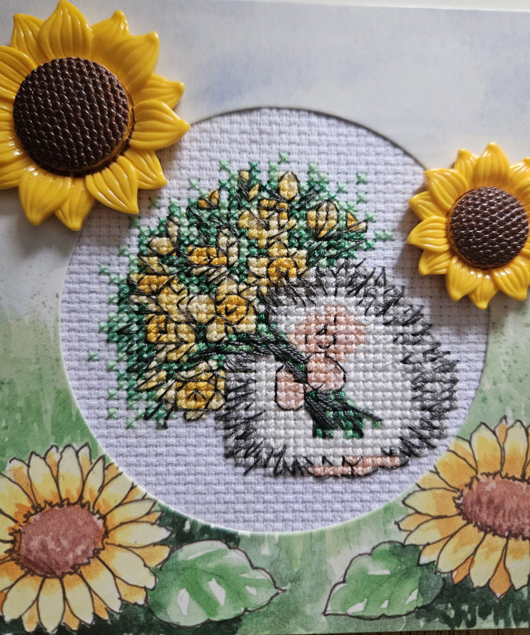 Hedgehog & sunflowers hand made cross stitched greetings card. 12cm x 12cm