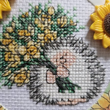 Hedgehog & sunflowers hand made cross stitched greetings card. 12cm x 12cm