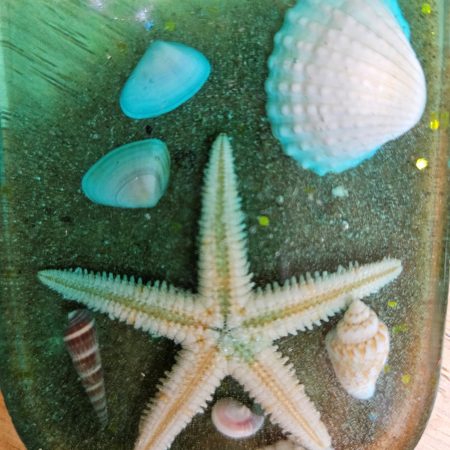 Nautical beach themed resin bottle opener shells & starfish