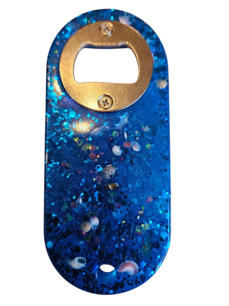 Blue beach themed nautical resin bottle opener with starfish, shells & glitter