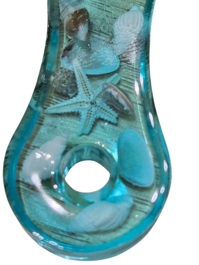 Sea themed resin bottle opener with real sea shells & starfish.