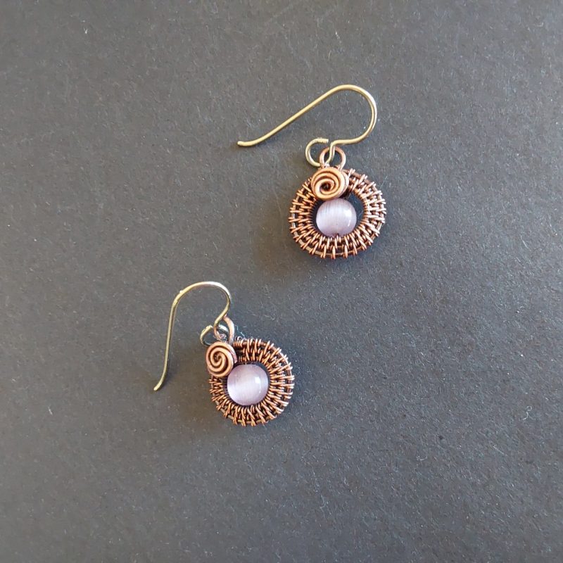 Mauve Cats Eye gemstone bead, copper wire weave non-tarnishing earrings with hypoallergenic ear wires. Earrings are 1/2 inch (1.5 cm) plus ear wire length of 2 cm.