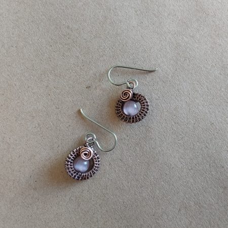 Mauve Cats Eye gemstone bead, copper wire weave non-tarnishing earrings with hypoallergenic ear wires. Earrings are 1/2 inch (1.5 cm) plus ear wire length of 2 cm.