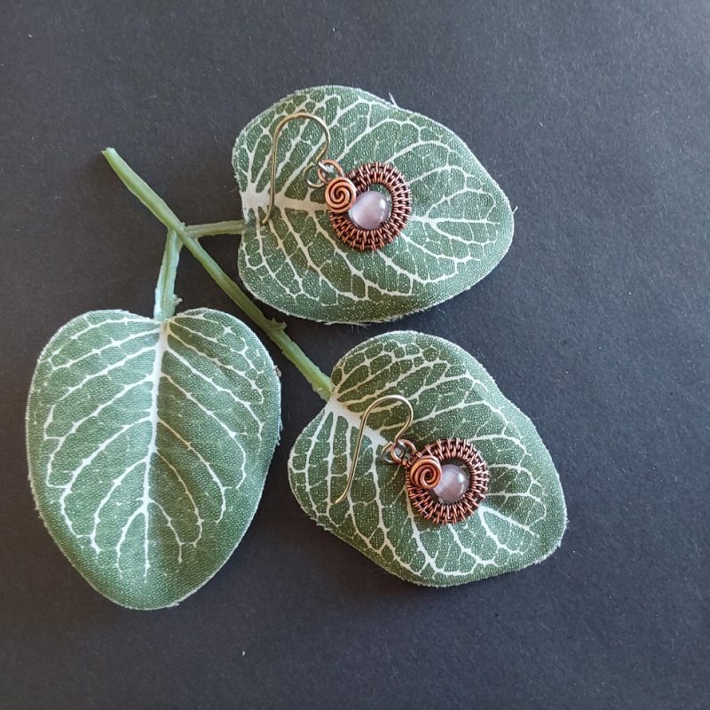 Mauve Cats Eye gemstone bead, copper wire weave non-tarnishing earrings with hypoallergenic ear wires. Earrings are 1/2 inch (1.5 cm) plus ear wire length of 2 cm.