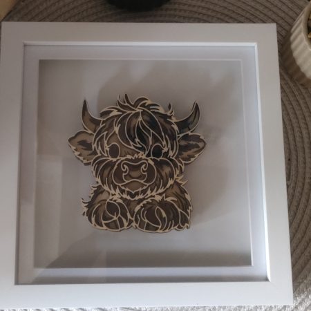 Framed layered highland cow