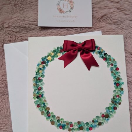 Hand painted watercolour greeting card - wreath design with red bow
