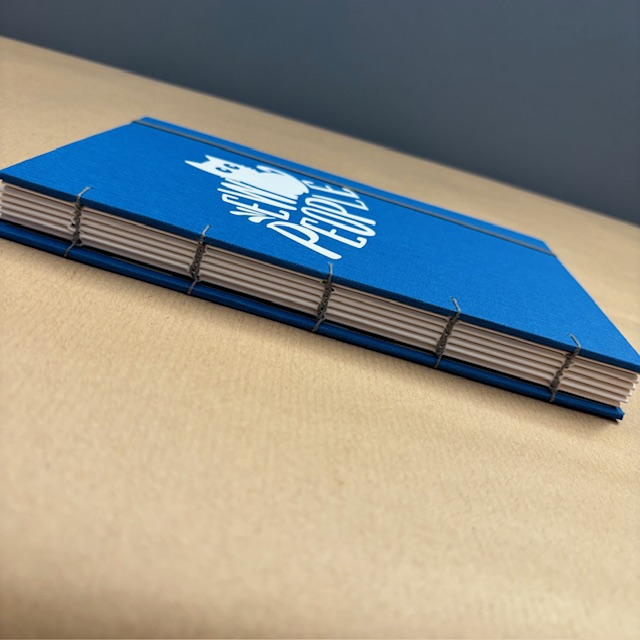 A5 Coptic stitch blue sketchbook | 48 pages | Ew people design | Elastic closure