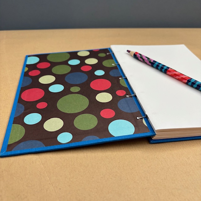 A5 Coptic stitch blue sketchbook | 48 pages | Ew people design | Elastic closure