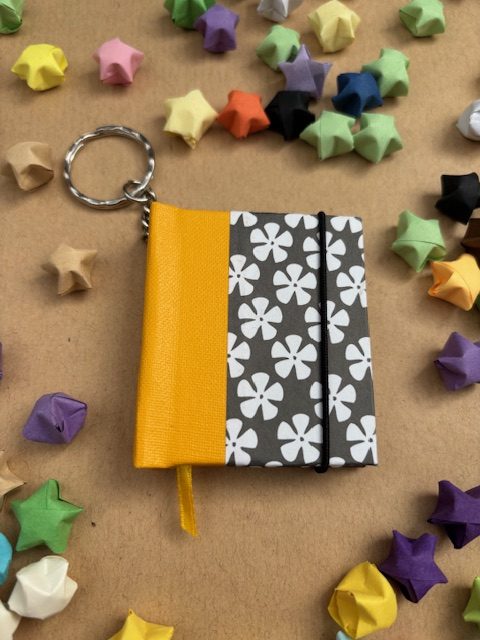 Handmade Notebook Keyring | 48 pages | Yellow spine with black and white flowers