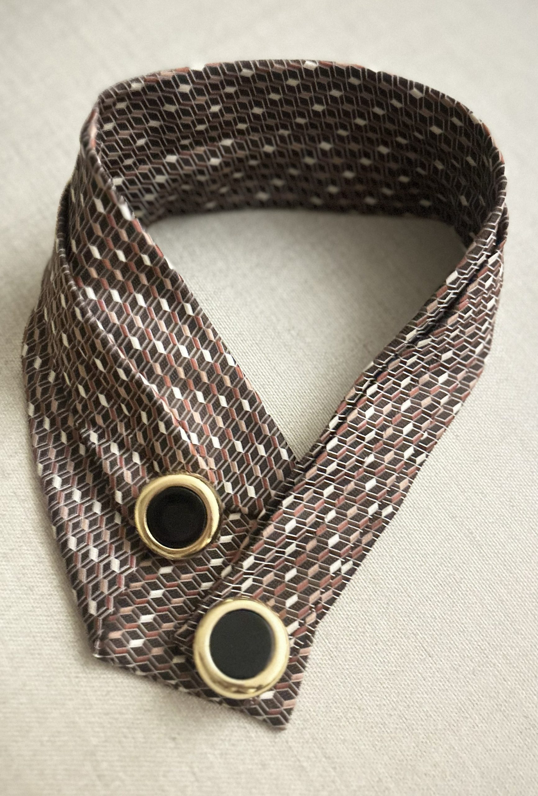 Handmade, necktie accessory in lovely earth tones with golden details