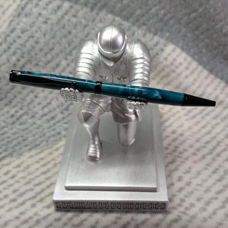 Slimline twist ballpoint pen in teal acrylic and black fittings