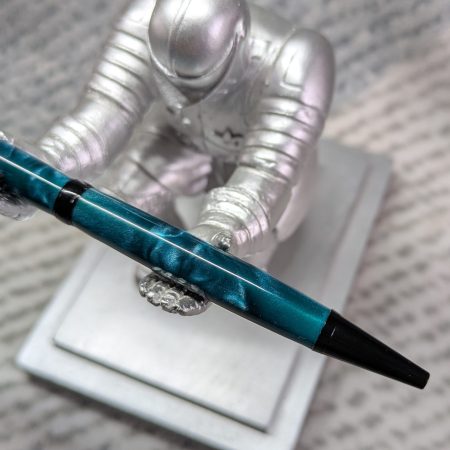 Slimline twist ballpoint pen in teal acrylic and black fittings
