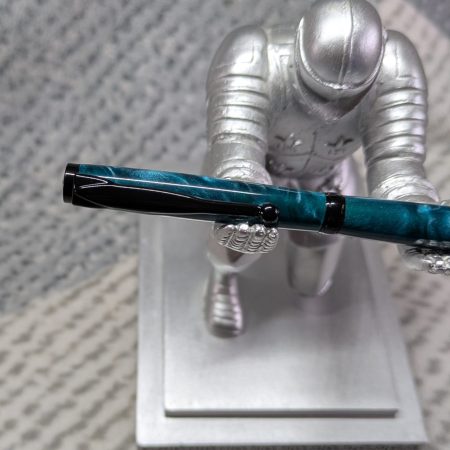 Slimline twist ballpoint pen in teal acrylic and black fittings