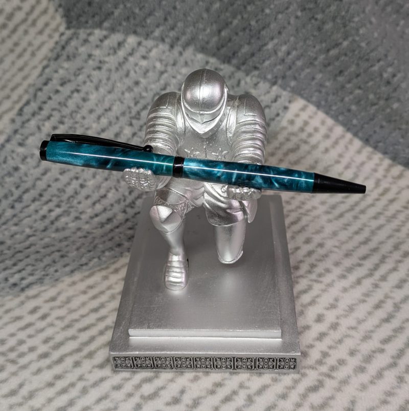 Slimline twist ballpoint pen in teal acrylic and black fittings