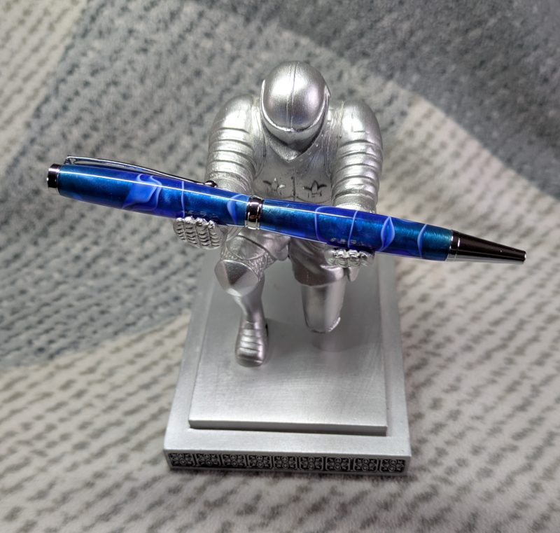 Slimline twist ballpoint pen in blue acrylic and shiny chrome fittings