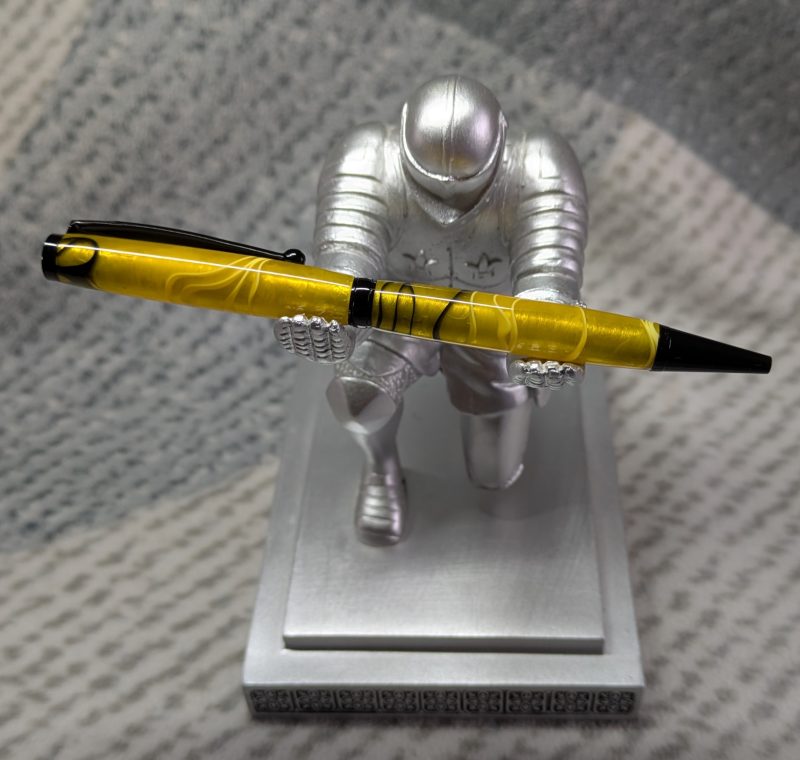 Slimline ballpoint pen in yellow and black acrylic with black fittings