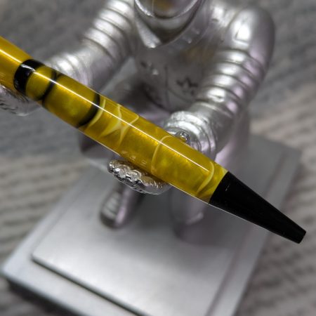 Slimline ballpoint pen in yellow and black acrylic with black fittings